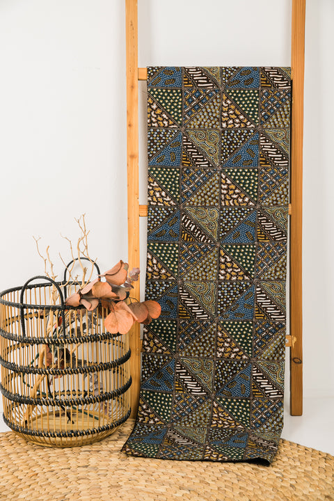 long table runner showing traditional tambal pattern in a towel rack